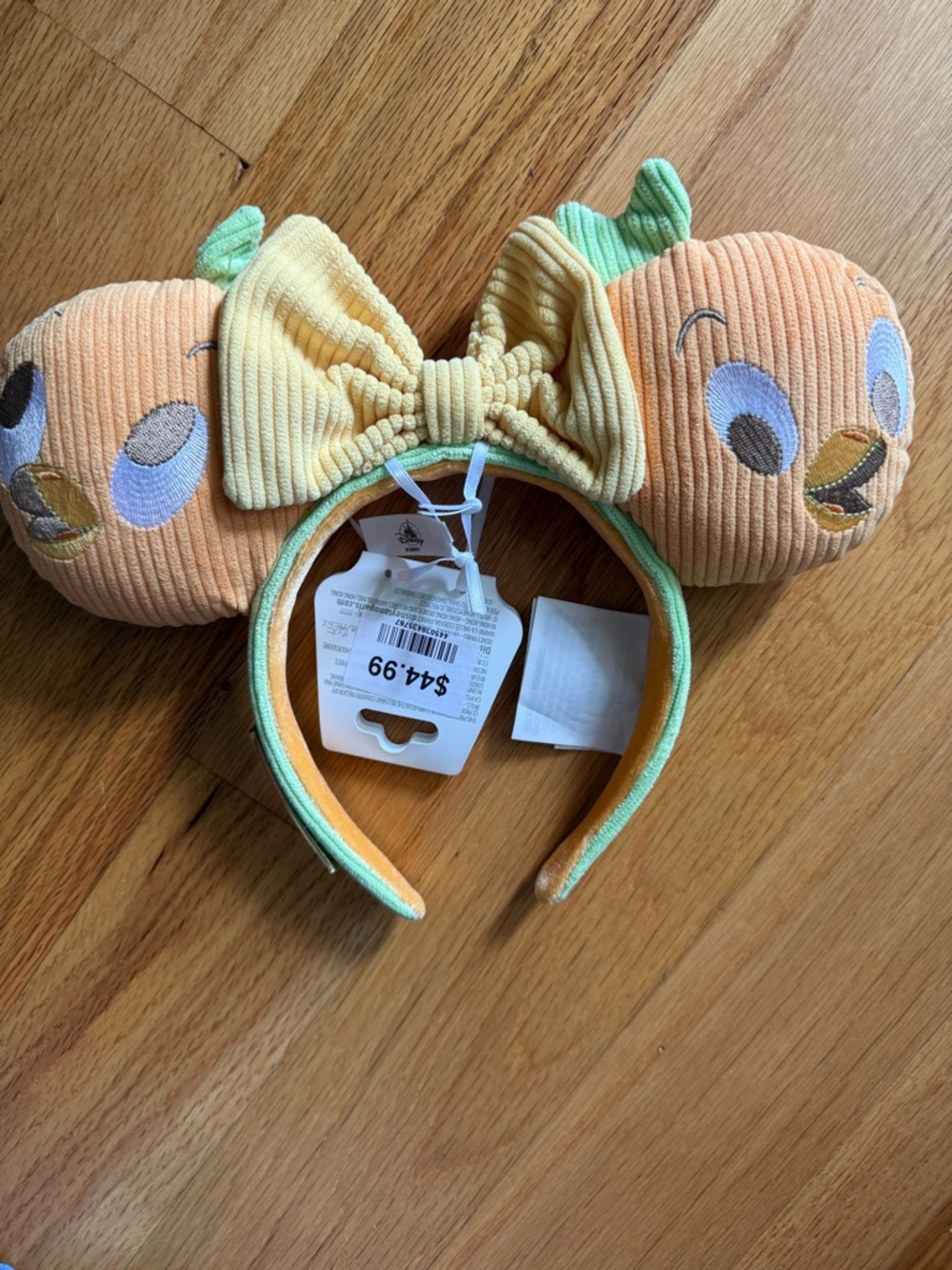 Loungefly Disney parks Orange Bird Corduroy Ear Headband with Yellow Bow